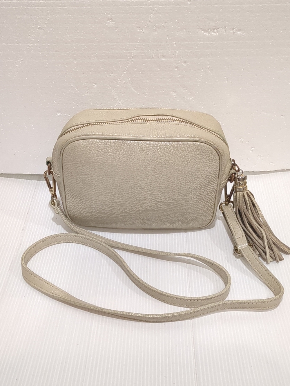 Compact Crossbody Bag Cream Leather & Large Tassel,   Italy